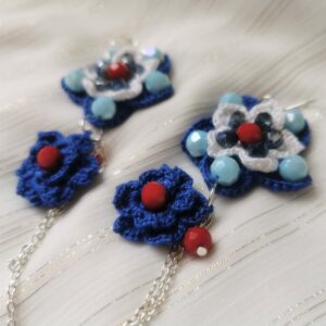 long blue crochet flower earrings with red beads